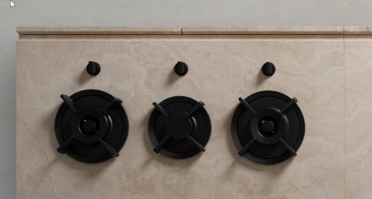 pitt luxury gas burners and control knobs integrated into a stone counter