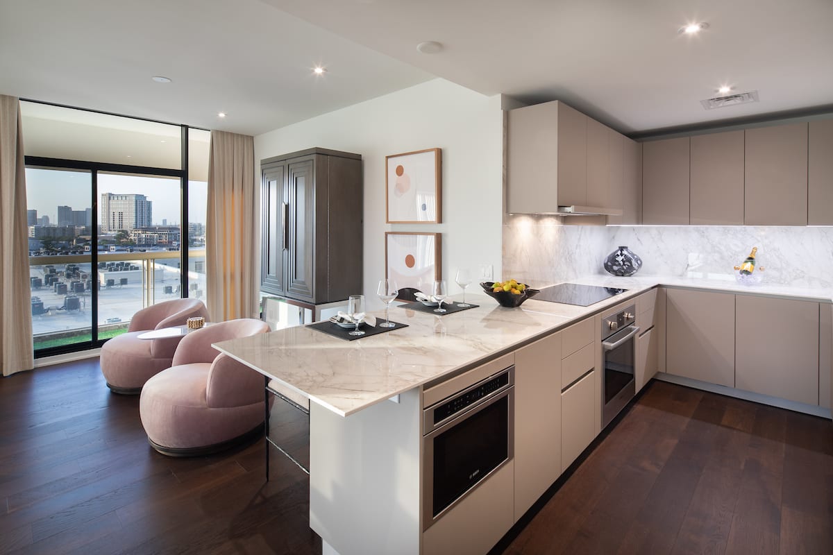 A modern eggersmann usa kitchen design featuring island bar seating and Bosch appliances.