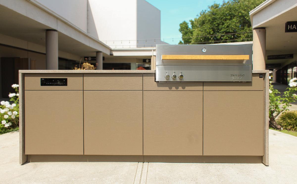 high-end outdoor kitchen island outside eggersmann Laguna showroom