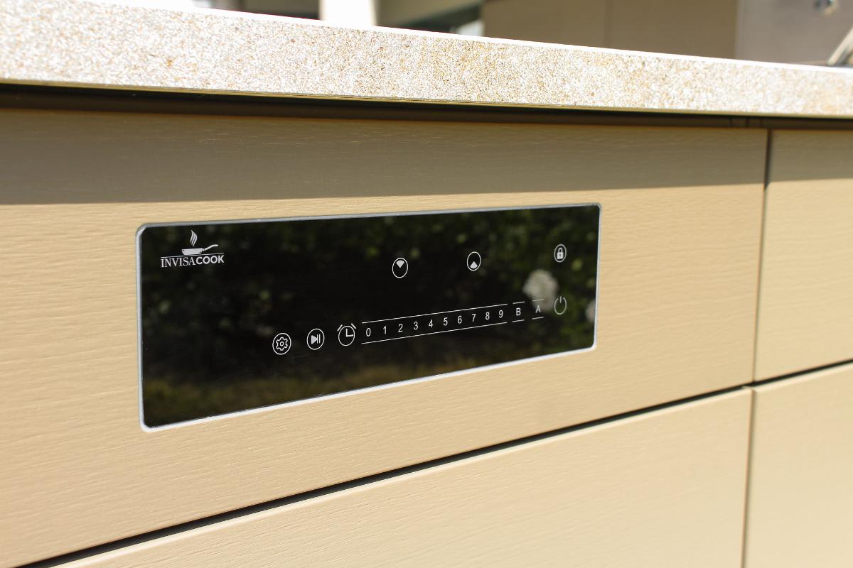 control panel for an invisicook hidden cooktop in an outdoor kitchen island outside eggersmann Laguna showroom