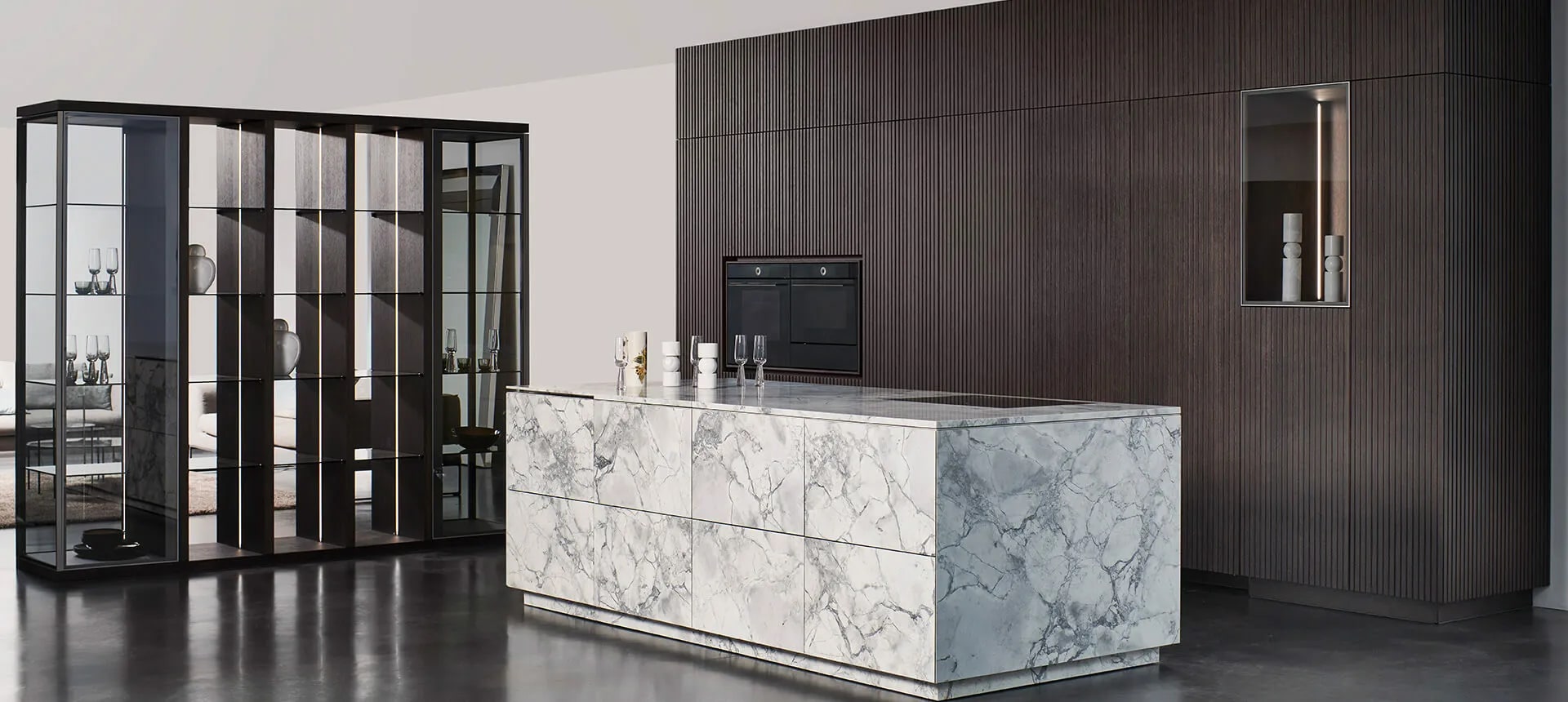 profile view of a unique kitchen island and lausanne front cabinets of a display kitchen of the eggersmann germany showroom