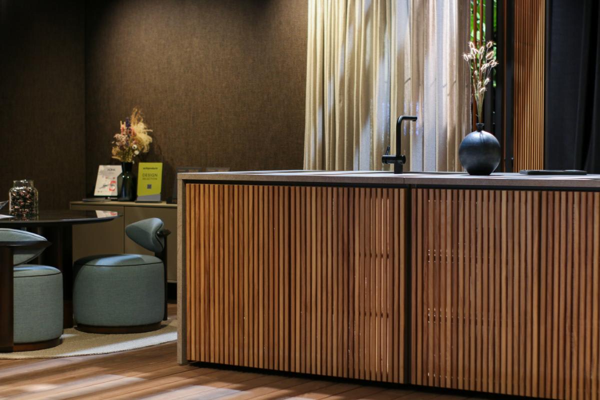 wood slat fronts and waterfall countertop of the c1 pure outdoor kitchen by eggersmann outdoor living