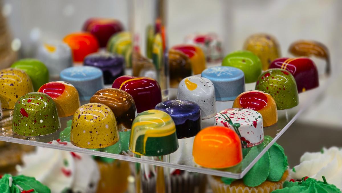 colorful truffles served at the wreath competition at the design center houston in december 2024