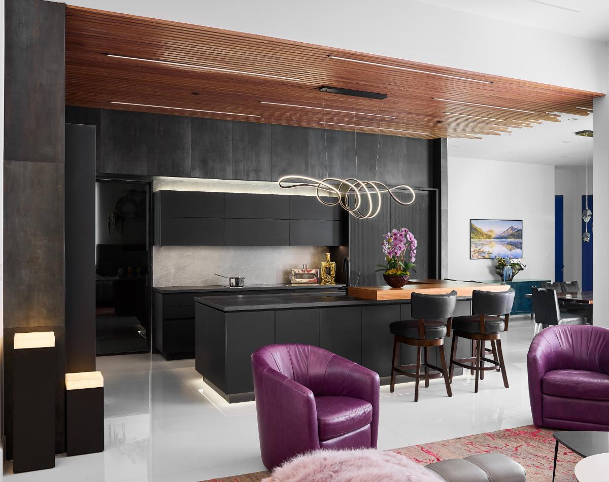show kitchen and living area in a new construction home in westlake tx
