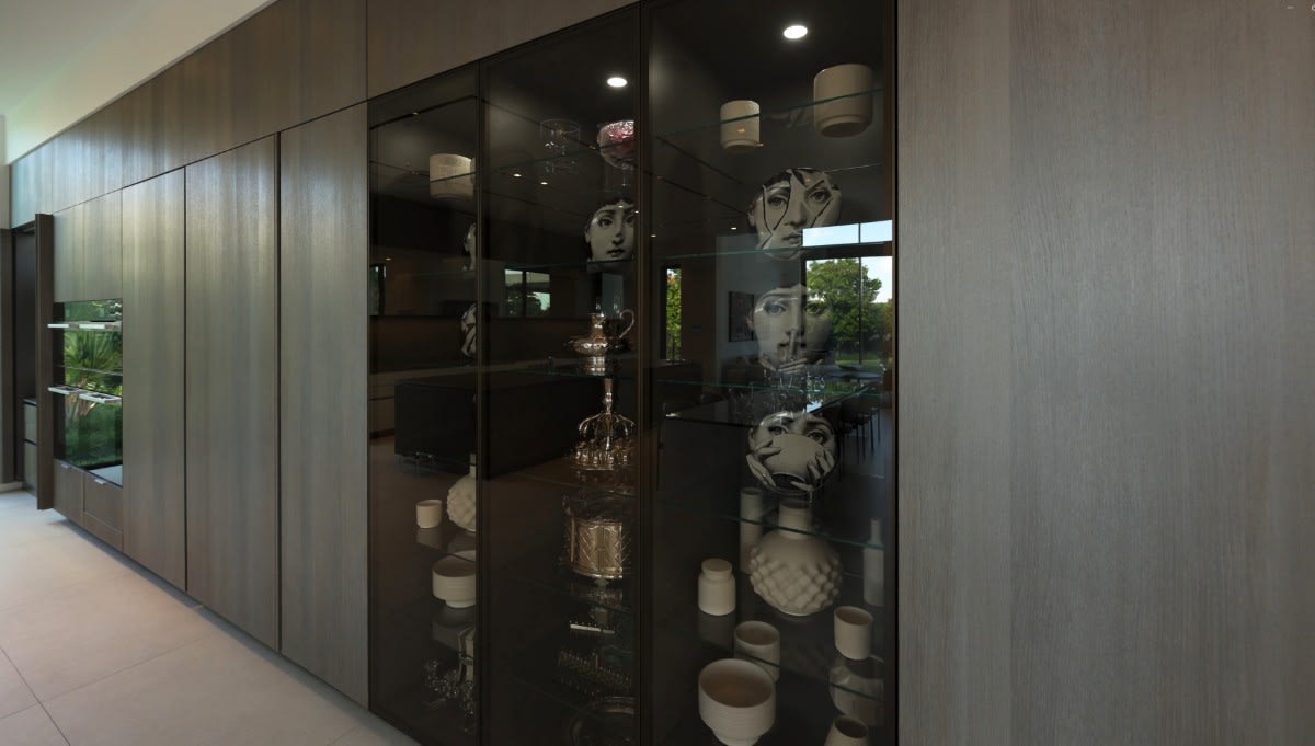 woodfield-country-club-boca-new-kitchen-glance-glass-front-display-cabinetry-oblique