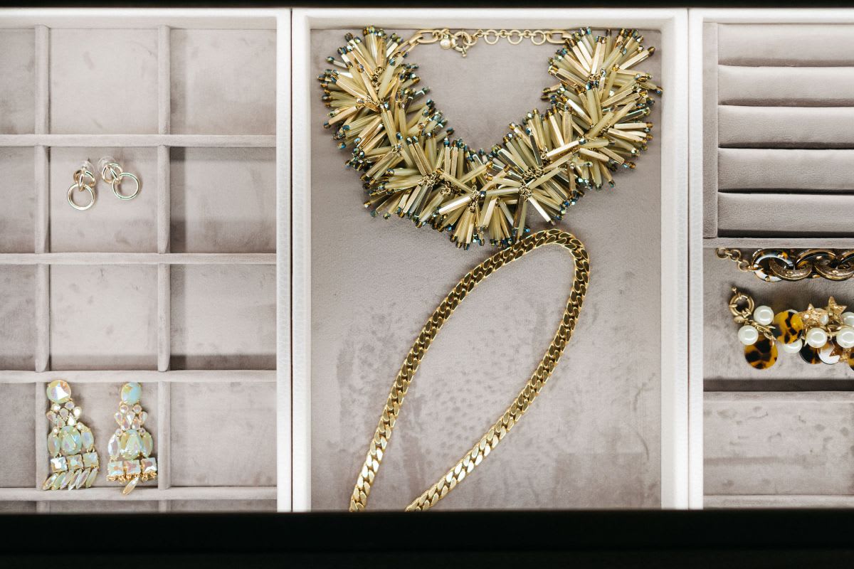 closeup of a handcrafted velvet-lined jewelry drawer organizer