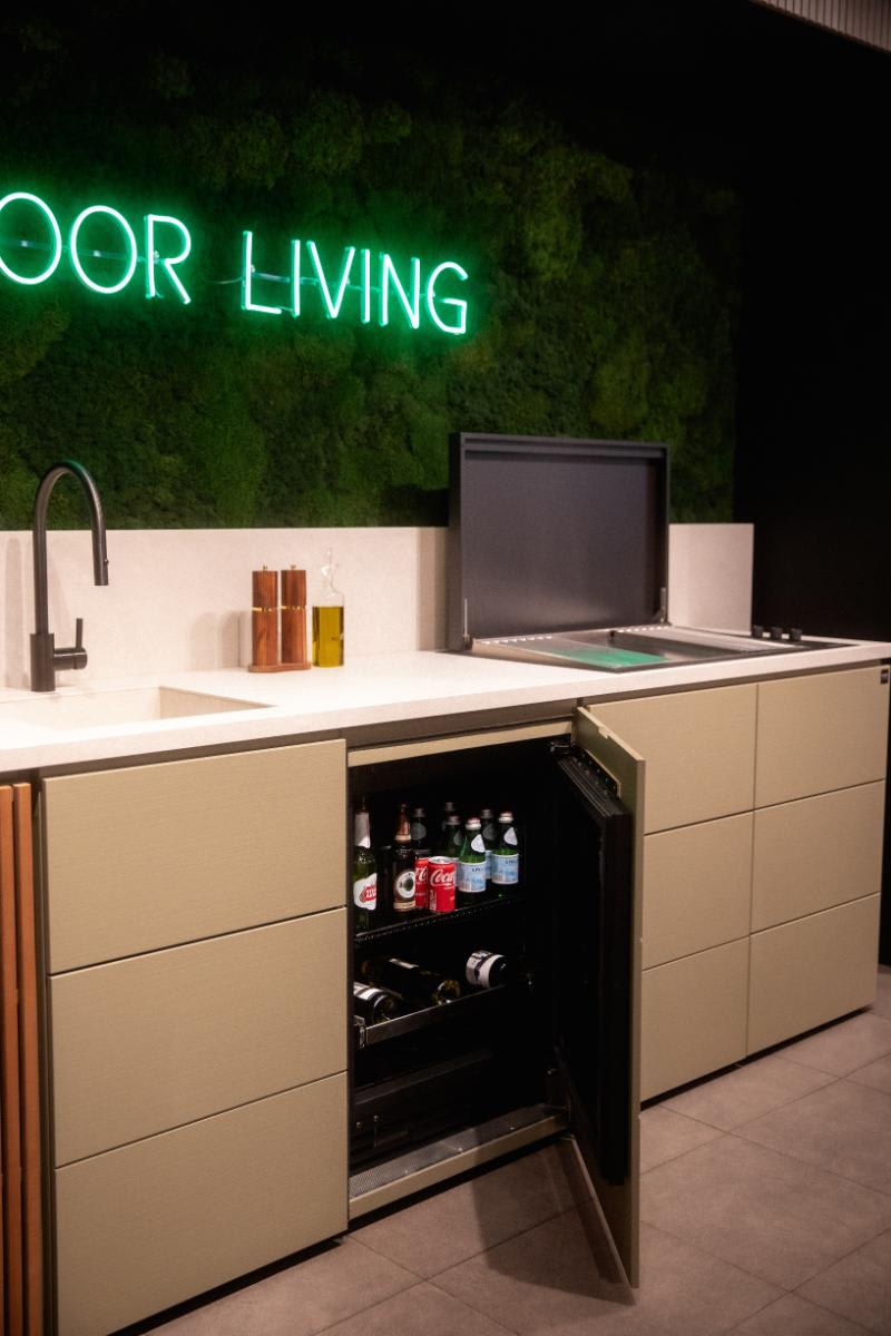 integrated refrigerator open in the cubic outdoor kitchen display in the eggersmann nyc showroom