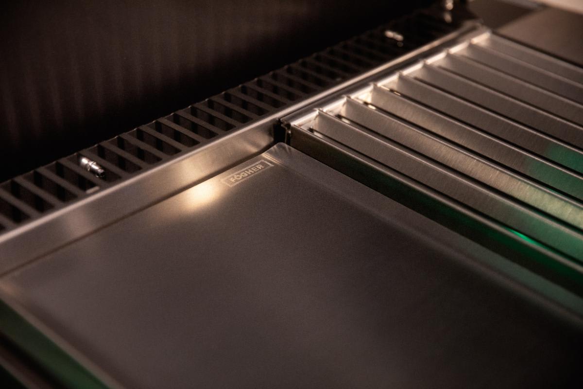 closeup of plancha grill cooking surfaces in the cubic outdoor kitchen display in the eggersmann nyc showroom