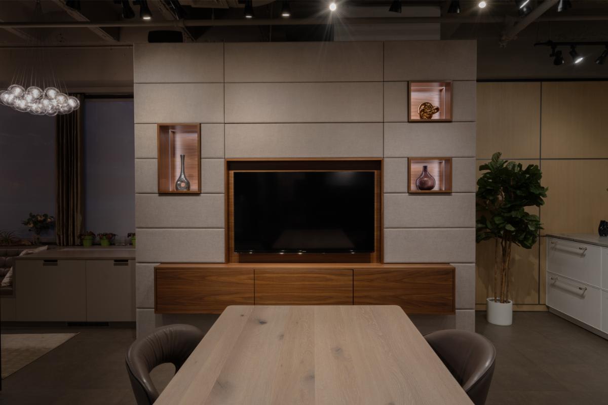 eggersmann nyc showroom media wall display with the storage and table top console closed