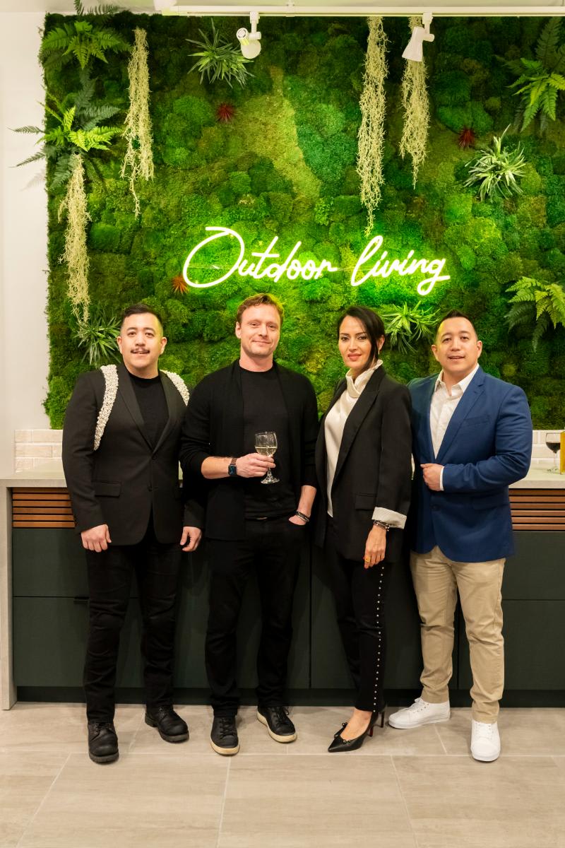 design professionals posed for a picture in the outdoor living display at design west hollywood 2025 in the eggersmann la showroom