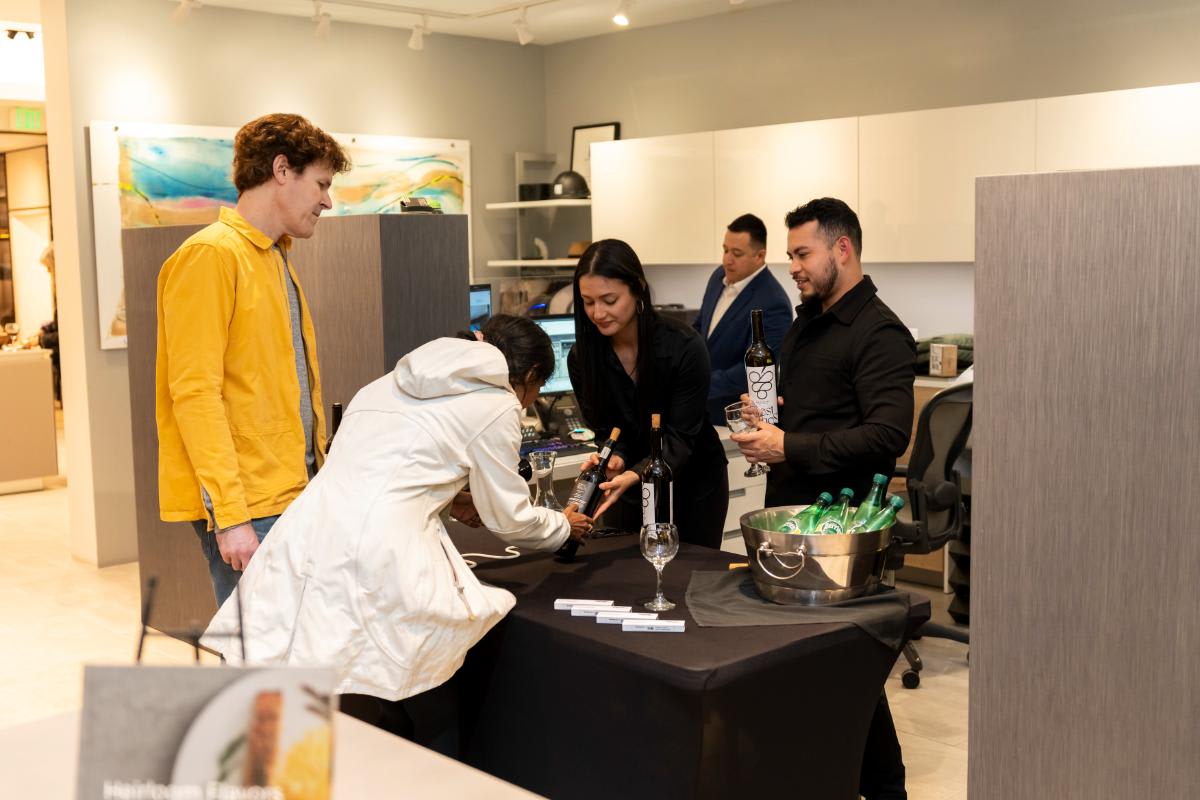 attendees learning about event co-sponsor IBests' wines in the eggersmann la showroom during design west hollywood 2025