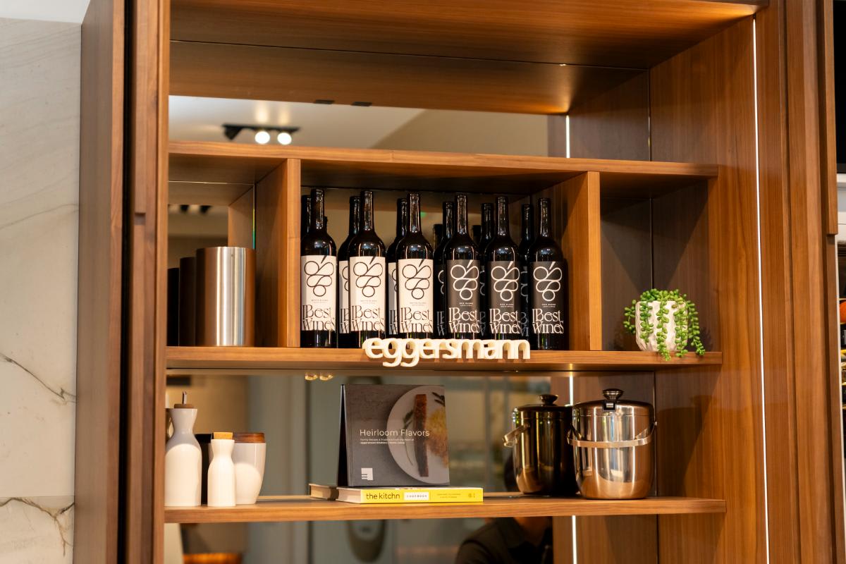 ibest wines featured in a pocket door cabinet as part of their sponsorship of design west hollywood 2025