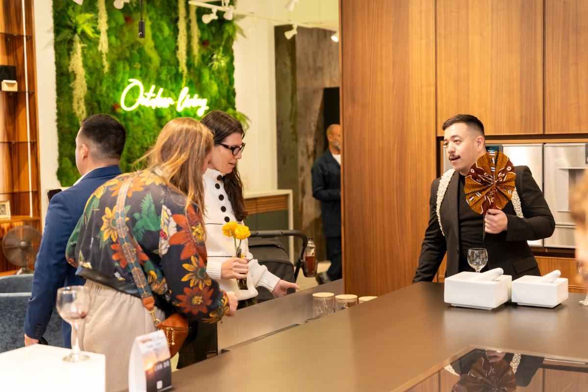 design professionals examining drawer interiors of a kitchen display in the eggersmann la showroom during design west hollywood 2025