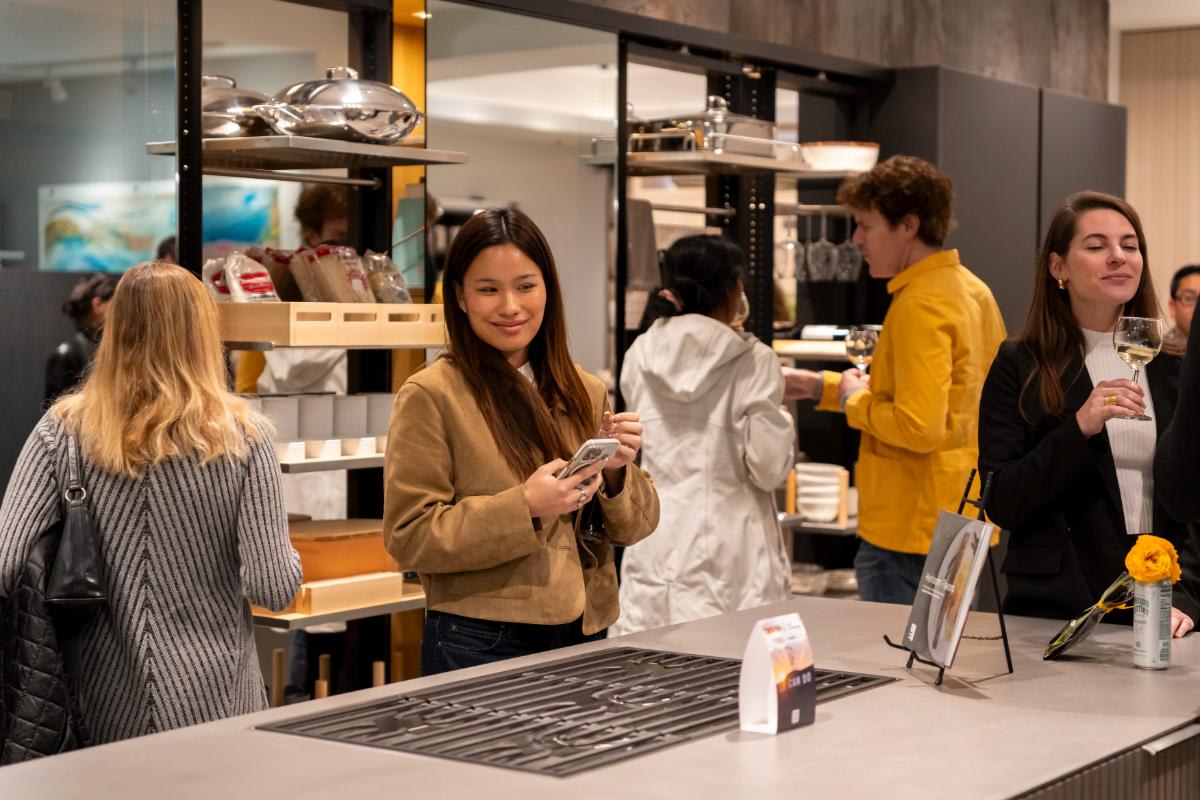 attendees exploring the eggersmann design solutions at design west hollywood 2025 in the la showroom