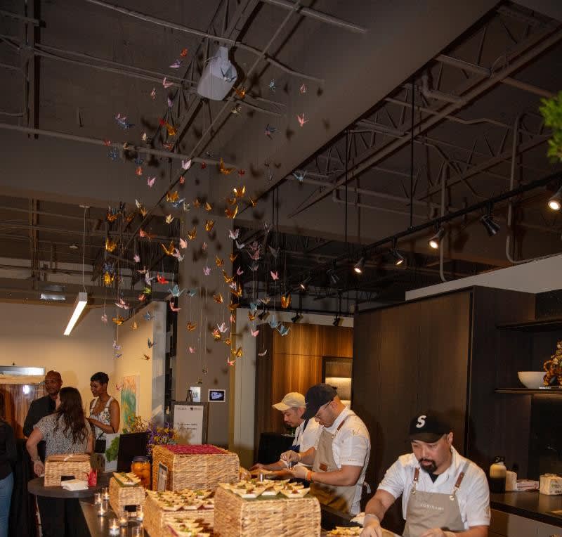 John Pham, Chef of Norigam, and his team prepare their Soft Shell Crab a la Veracruzana for the chef's night out competition at eggersmann houston's grand re-opening