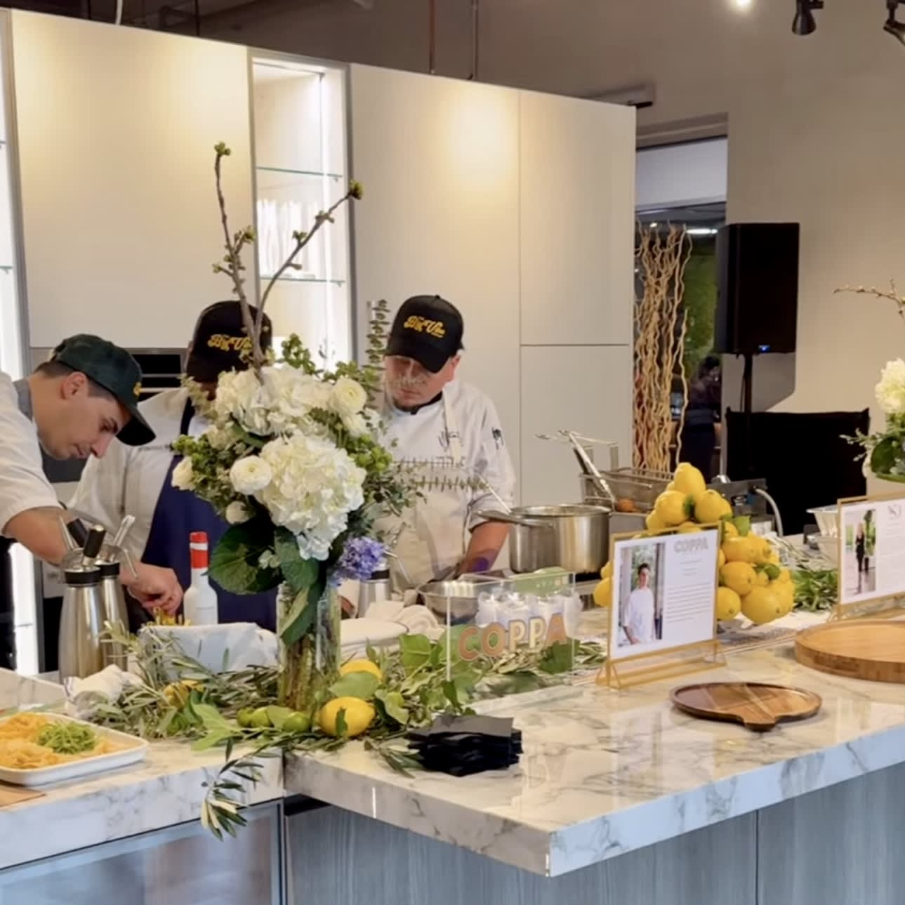 coppa's chefs preparing for the chef's night out competition at eggersmann houston's grand re-opening