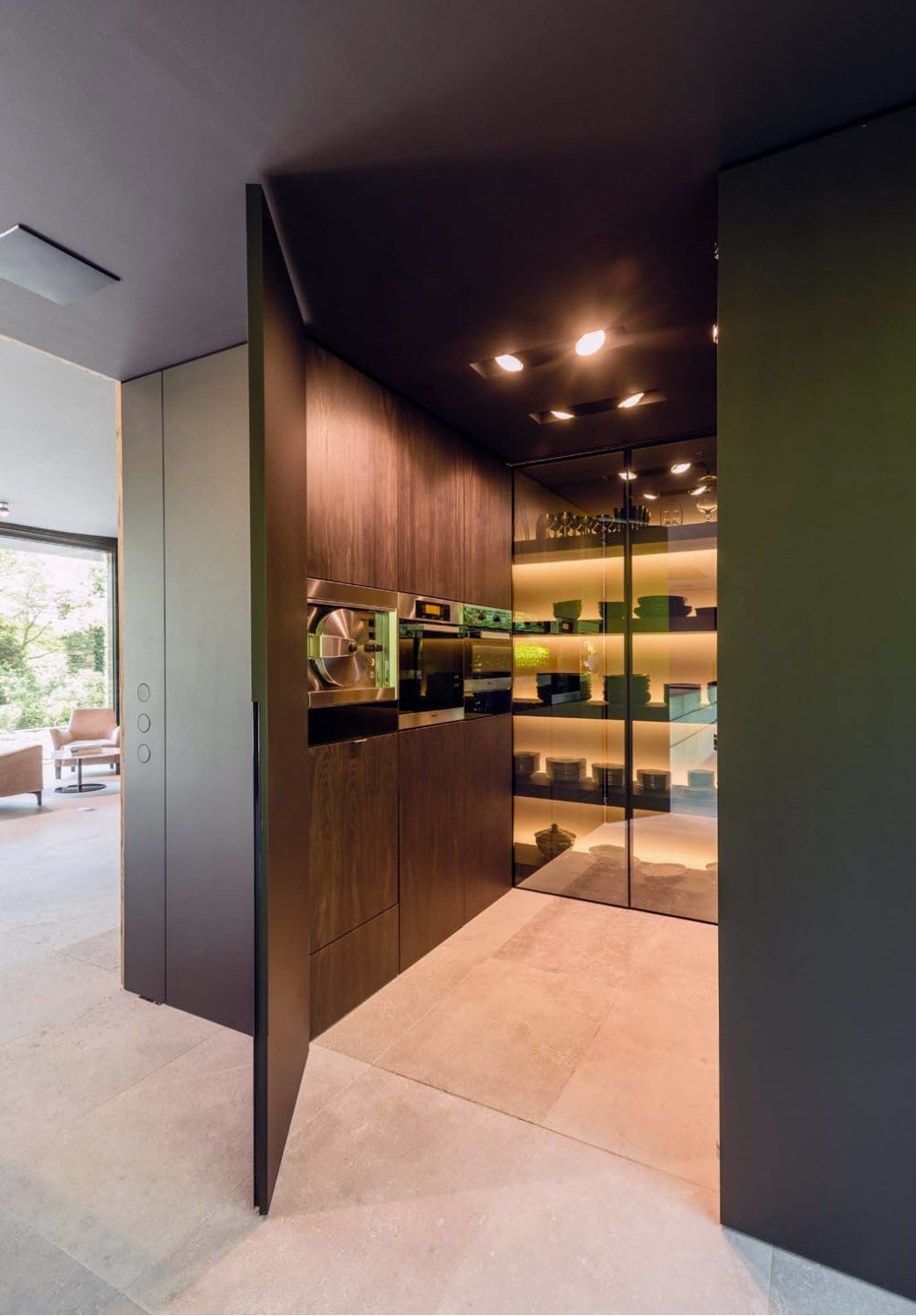 hidden kitchen entry with a arlu pivotica pro pivot door