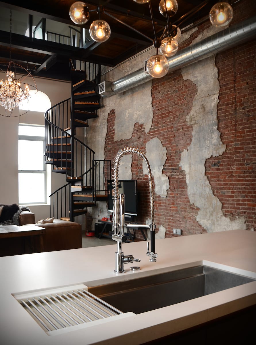 A galley kitchen featured in a LUXE Home & Design kitchen design.