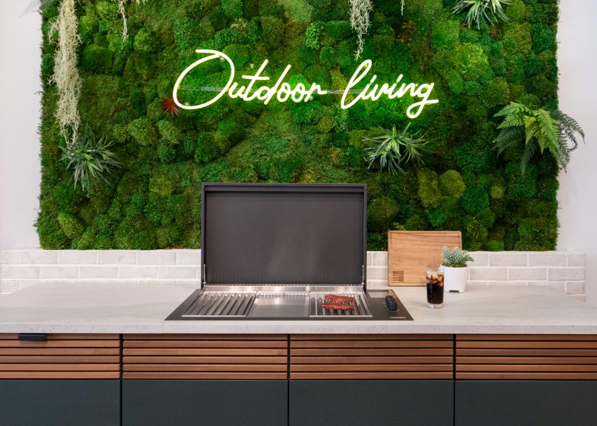close-up of grill, counter and tops of cabinetry fronts in the cubic outdoor living display inside eggersmann la showroom