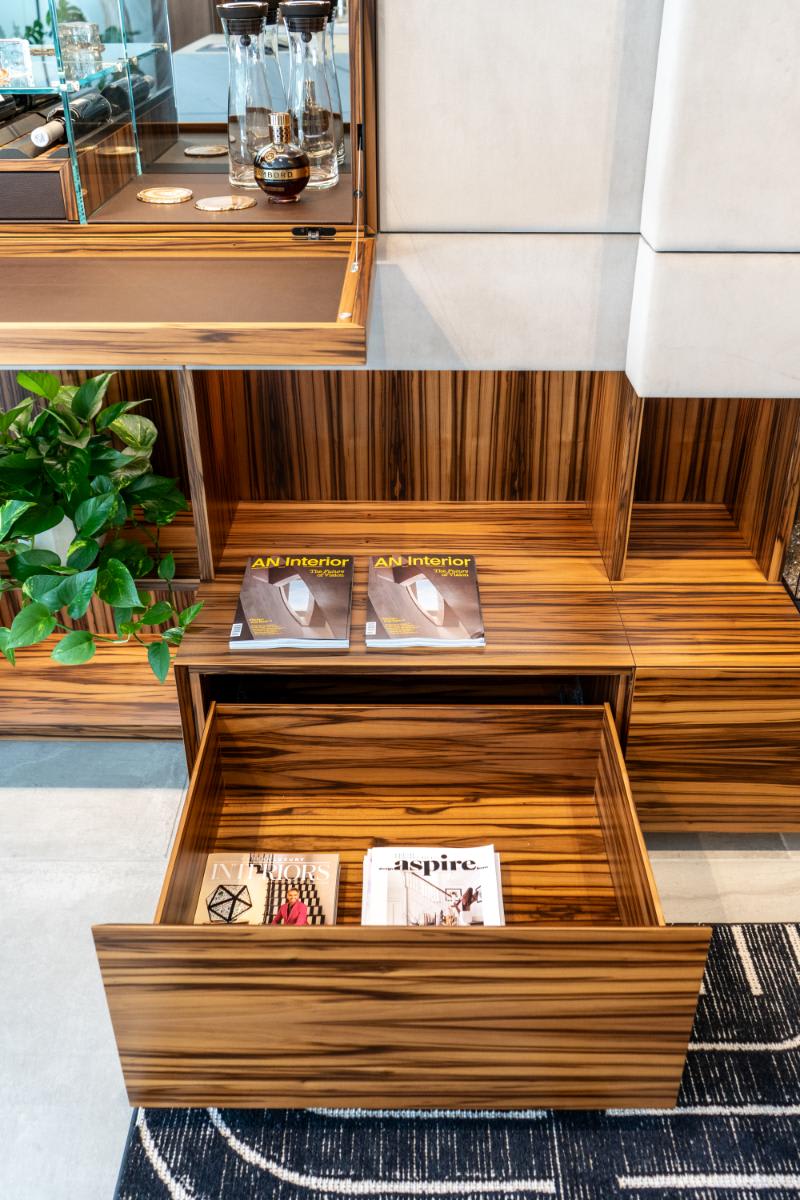 opened closed storage drawer in the living area media wall display in the eggersmann la showroom