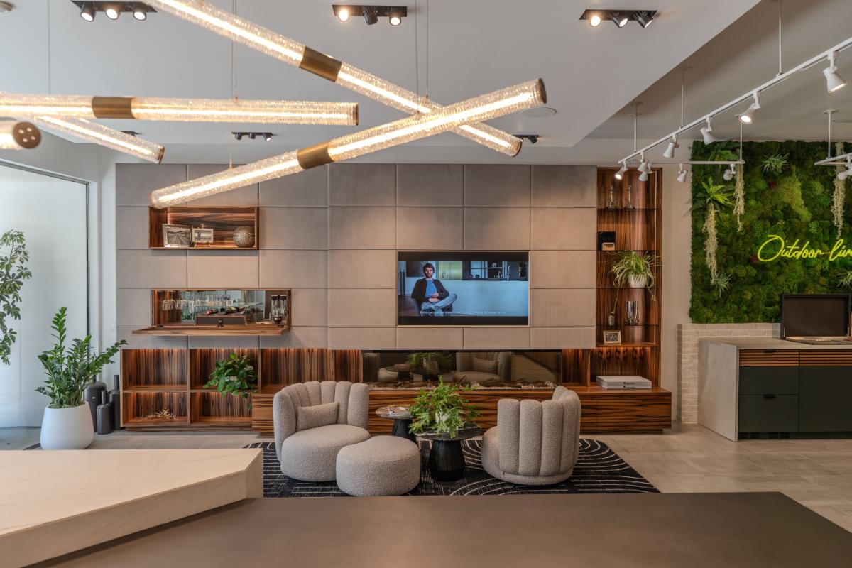 living area media wall display from the core ash light kitchen area of the eggersmann la showroom