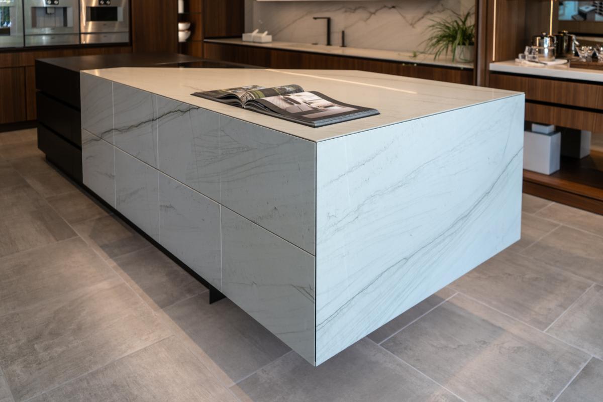 closeup of the stone section of the skywalk kitchen island from the unique cabinetry collection in the eggersmann la showroom