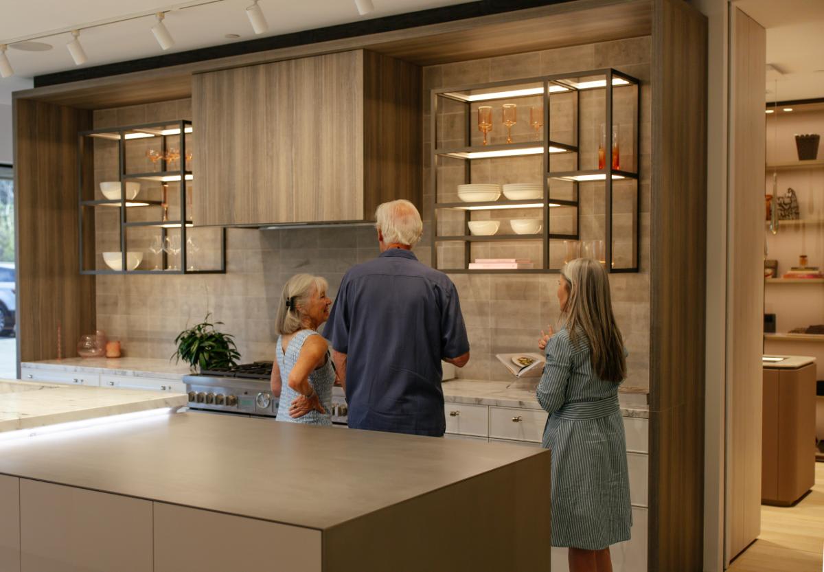 guests explore one of the indoor kitchen displays during an outdoor living event in august 2025 at eggersmann laguna