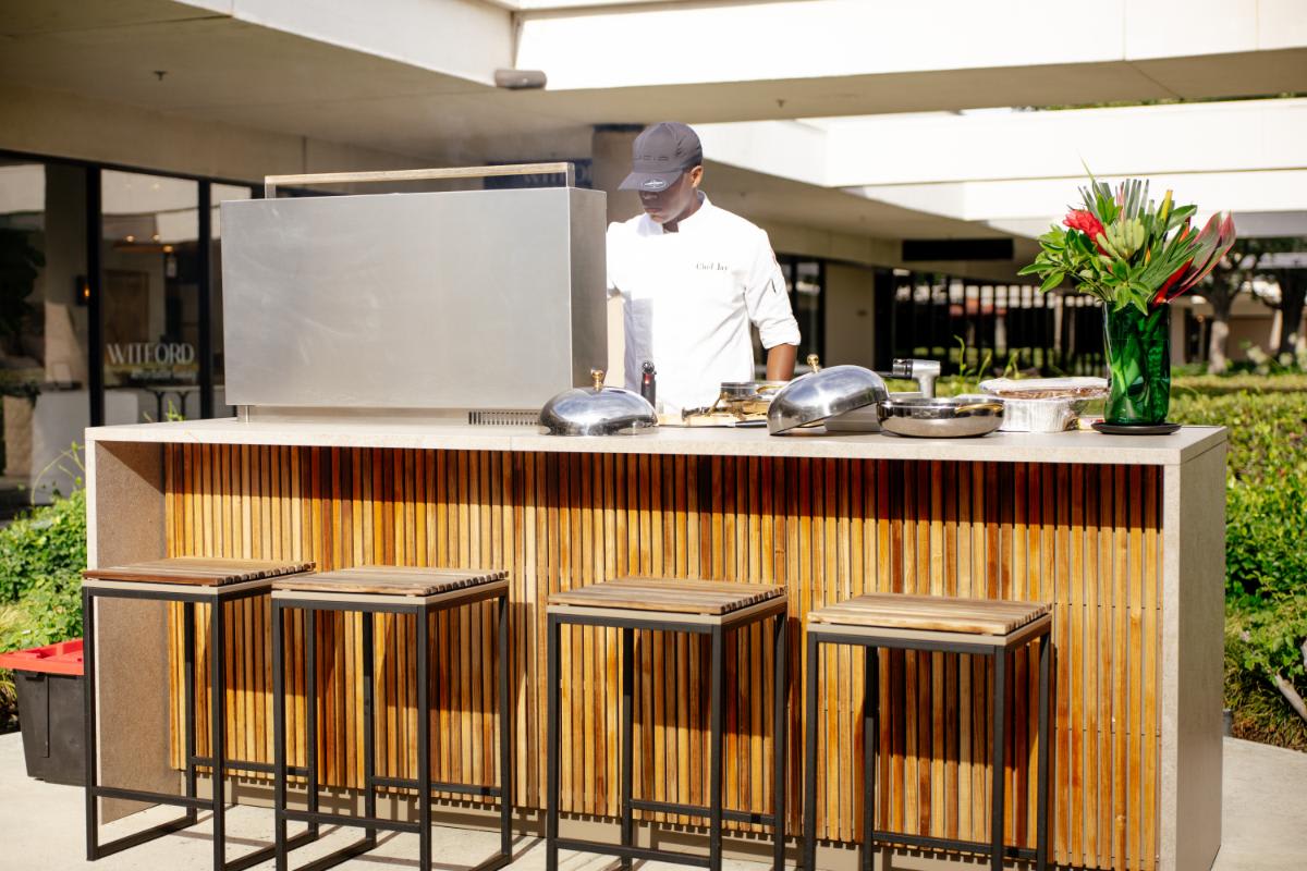 grillmaster at work in the outdoor kitchen display at eggersmann laguna during the CUBIC event in august 2025