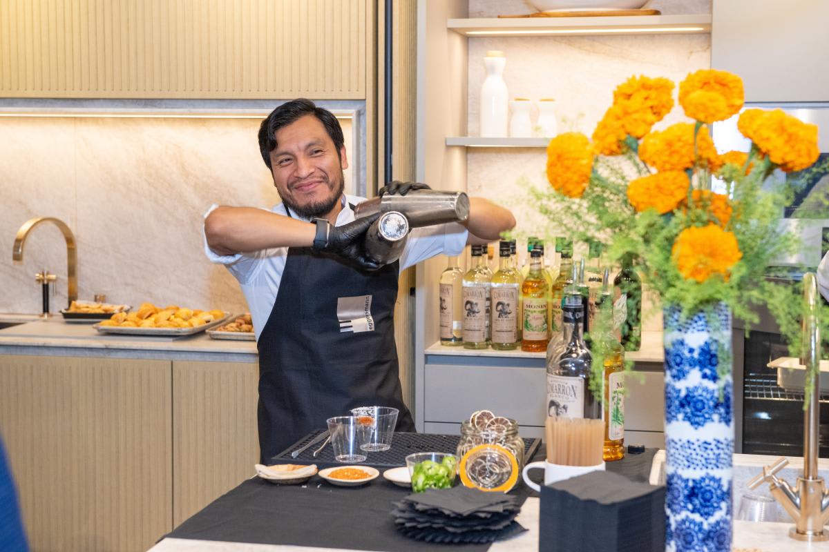 flora mixologist mixing ketel one margaritas for the guests of the 2025 aia home tour appreciation party in the eggersmann houston showroom