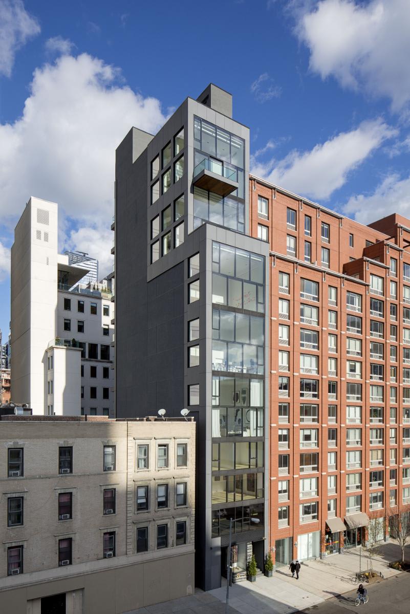 left side and front of chelsea waterside nyc building from W 23rd Street, new york city