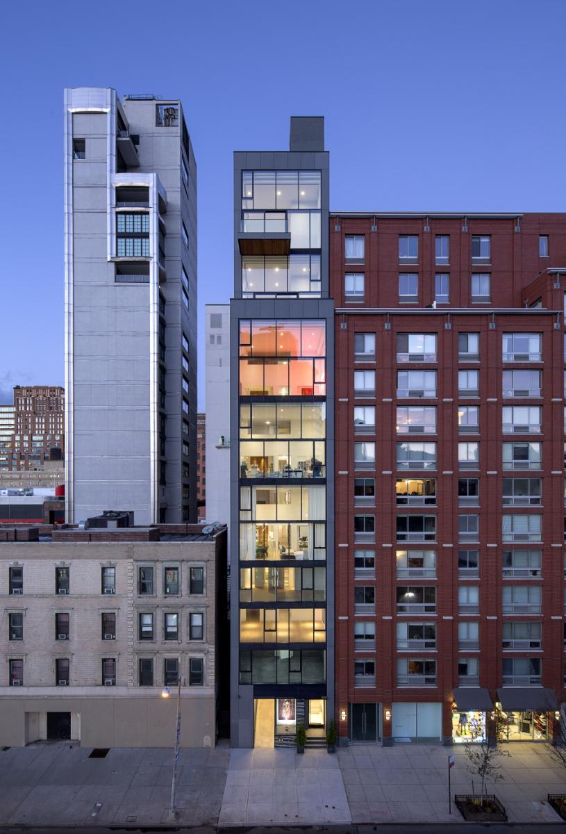chelsea waterside nyc building front taken at night from W 23rd Street, new york city