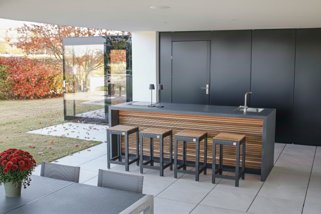 cubic outdoor livign kitchen and living area on a patio