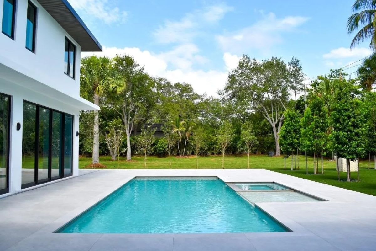 pool in backyard of a pinecrest florida home