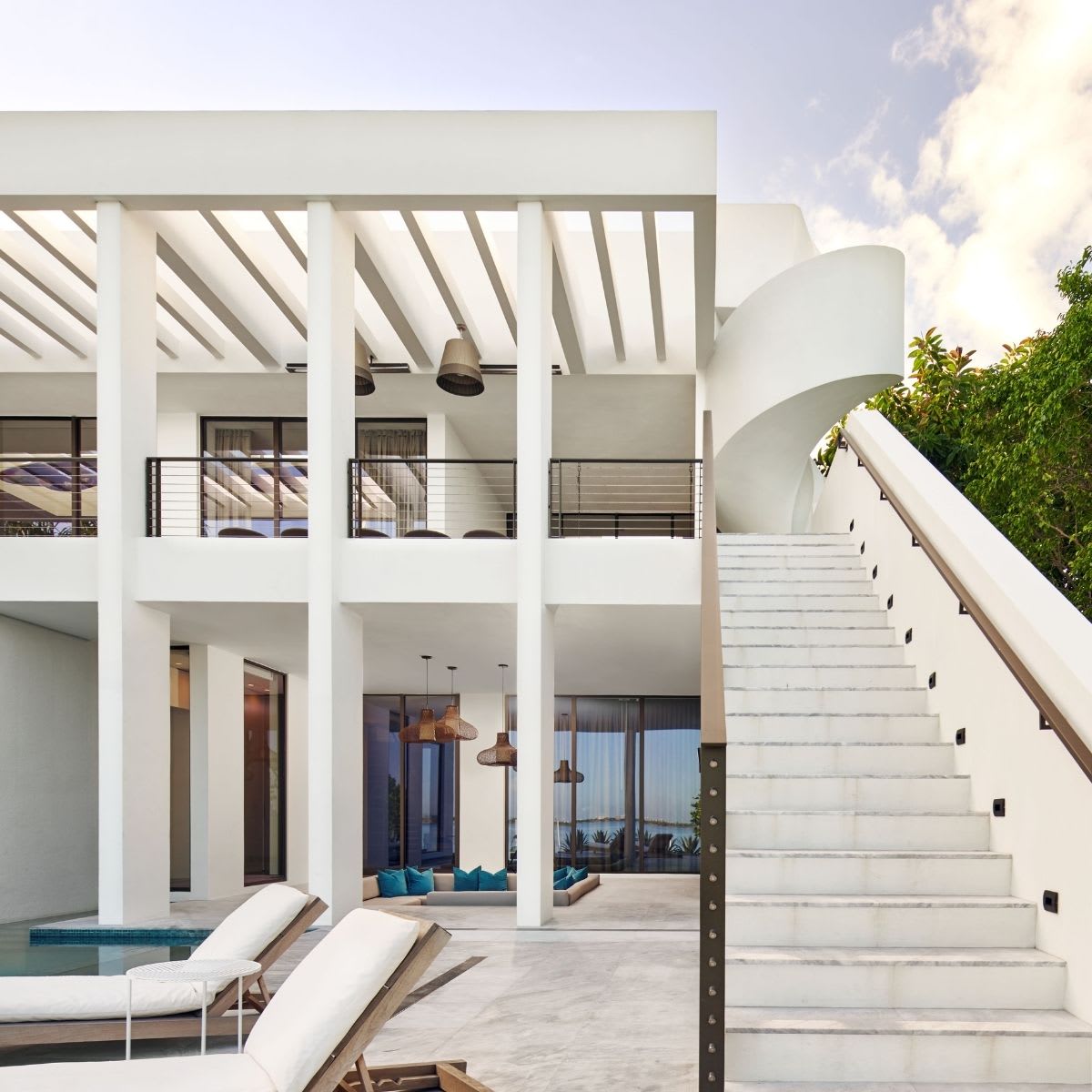 exterior pergola, stairs, and stone decking utilize pantone's 2026 color of the year