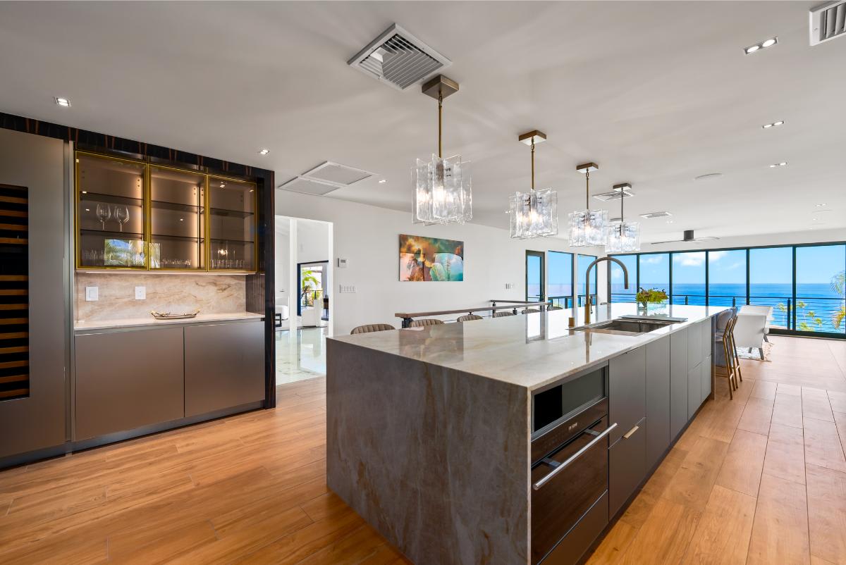 modern kitchen with glossy reflective finishes designed by eggersmann laguna for a home in honolulu hawaii