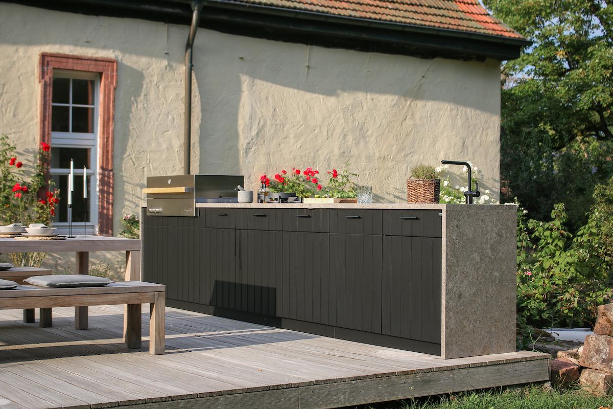 modern outdoor kitchen with grill custom-designed by eggersmann with cubic outdoor living cabinetry