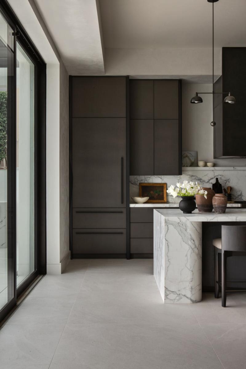 dark concrete hand-finish cabinetry in a luxury kitchen designed by eggersmann laguna for a corona del mar home