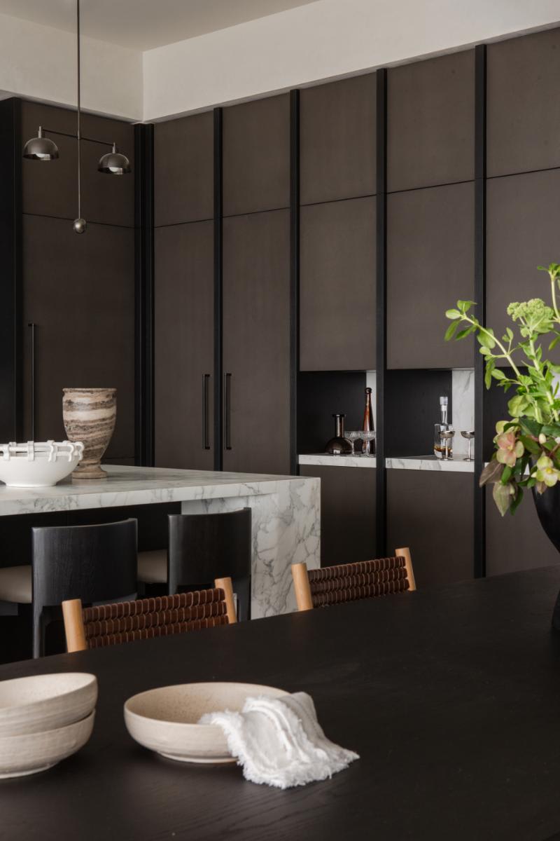 dark concrete-finish cabinetry in a luxury kitchen designed by eggersmann laguna for a corona del mar home