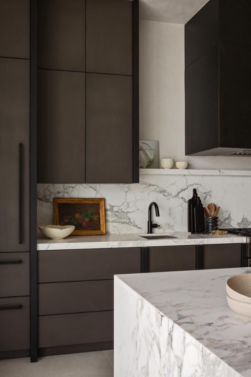 sleek handleless concrete-finish cabinetry in a luxury kitchen designed by eggersmann laguna for a home in corona del mar