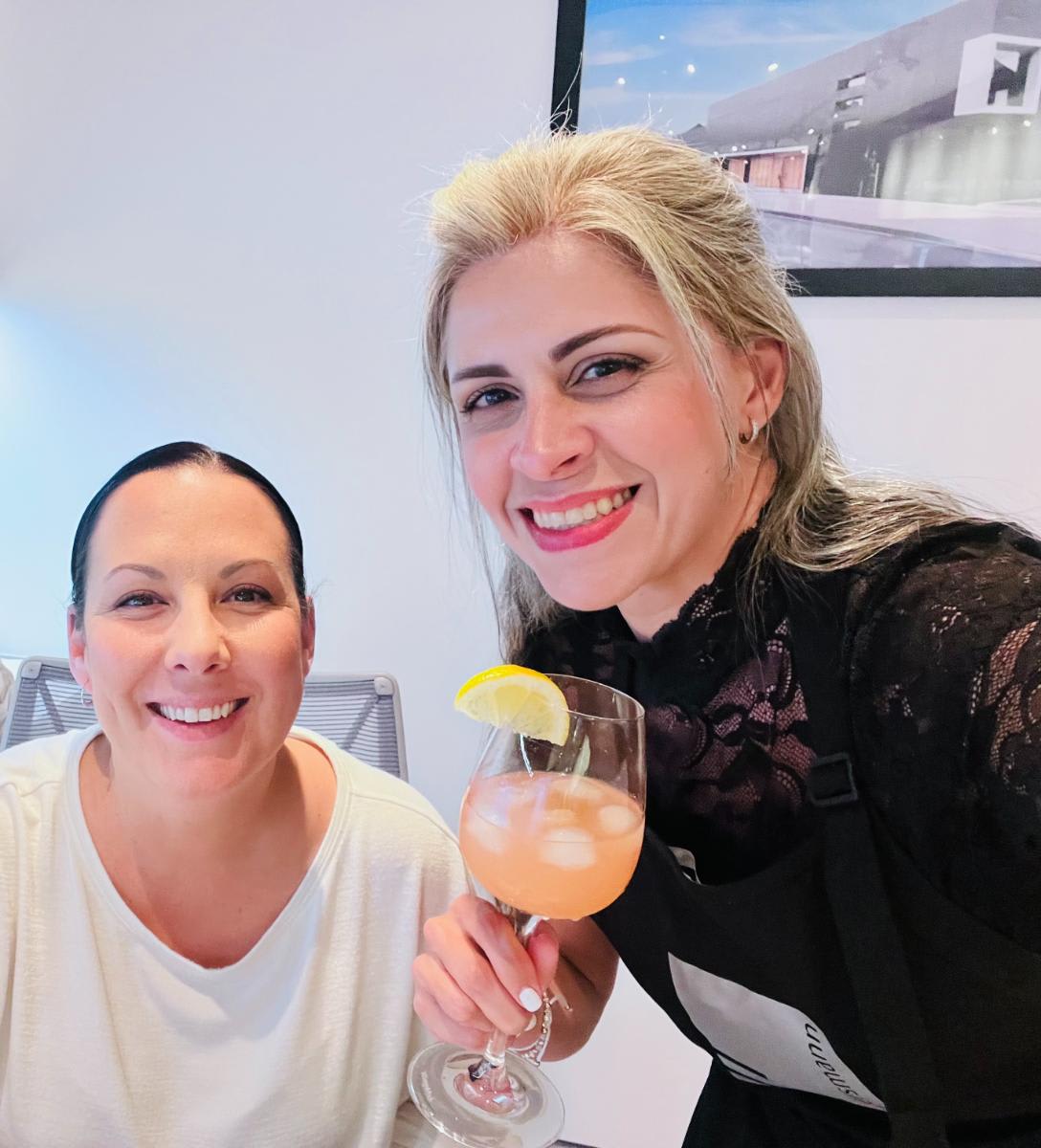 ericka clifford eggesrmann florida manager with Lorena Iazzetta Technical Design Director enjoying a cocktail
