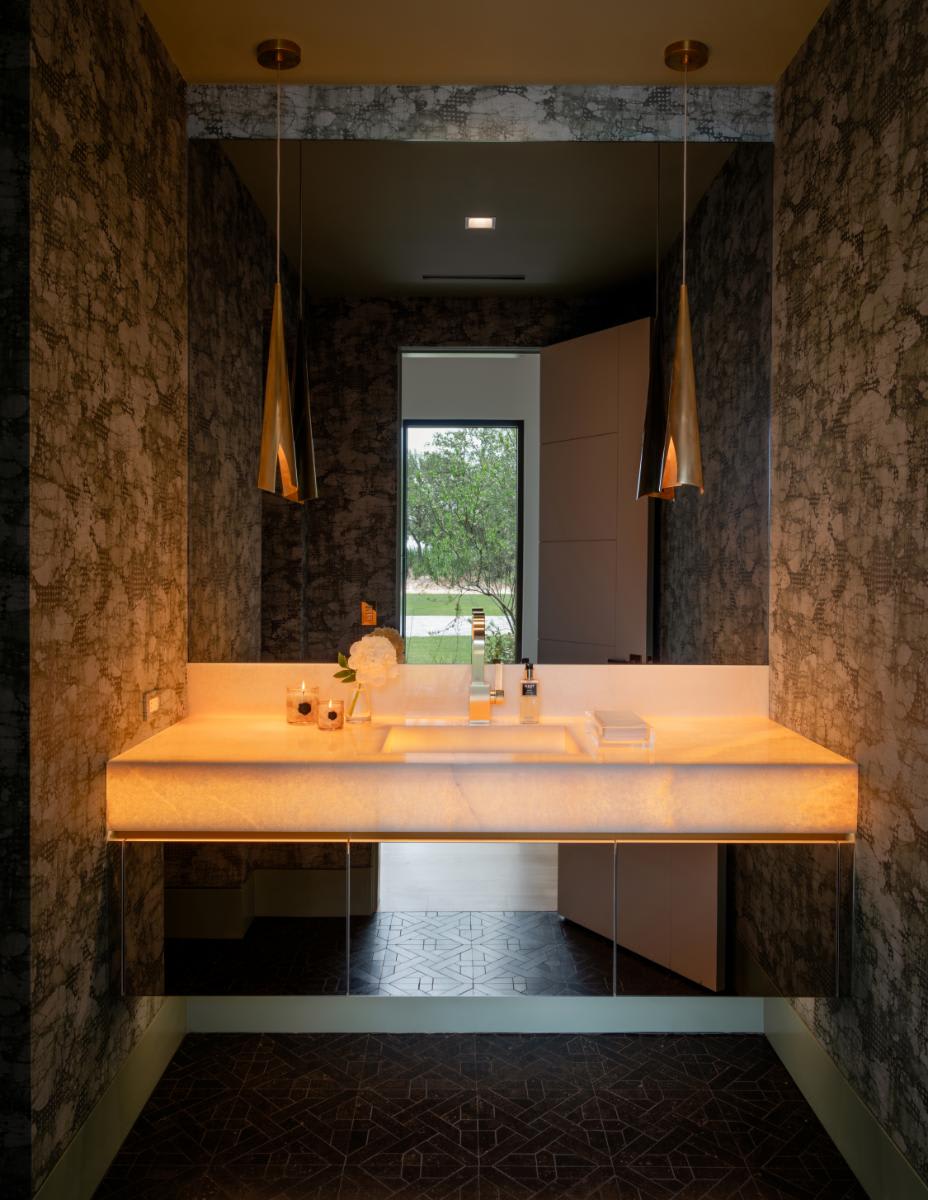 illuminated sink top of a vanity desgined by eggersmann for a david lewis home