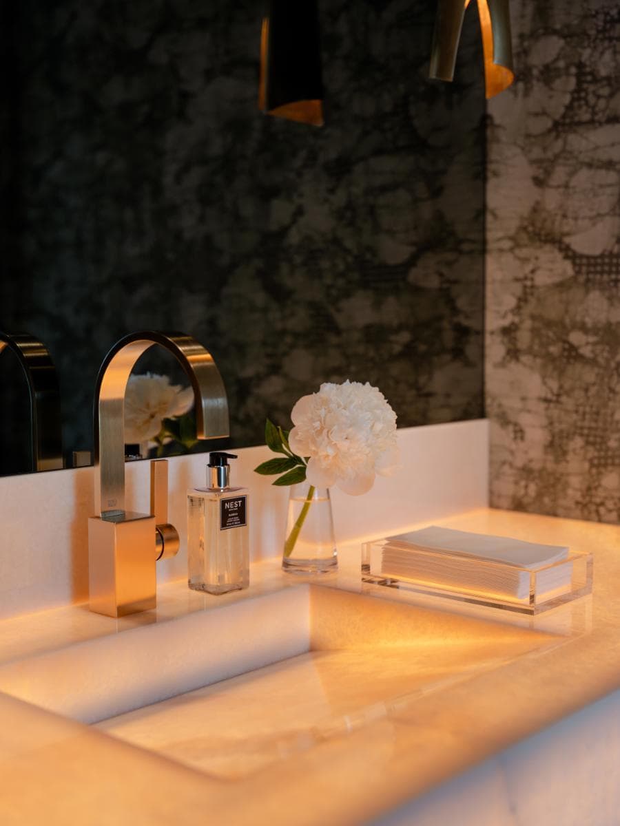 glowing sink top of a vanity desgined by eggersmann for a david lewis home