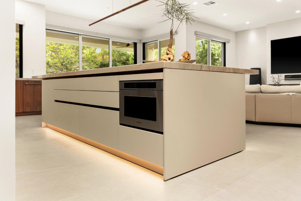 island-installed microwave in a kitchen designed by eggersmann laguna for a renovated newport beach home