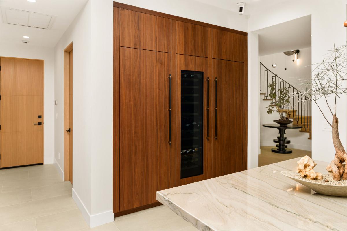 wine fridge and integrated refrigeration in a kitchen designed by eggersmann laguna for a renovated newport beach home