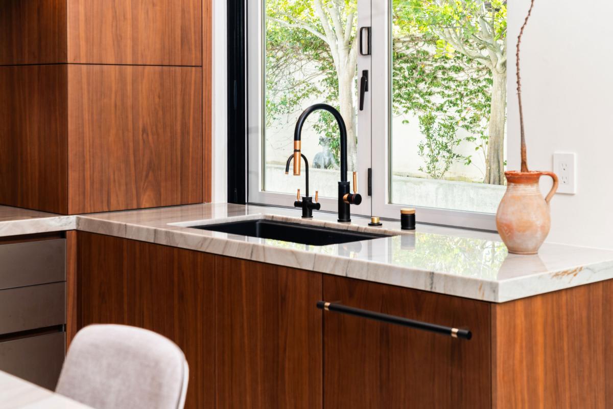 kitchen sink of a modern luxury kitchen designed by eggersmann laguna for a renovated newport beach home