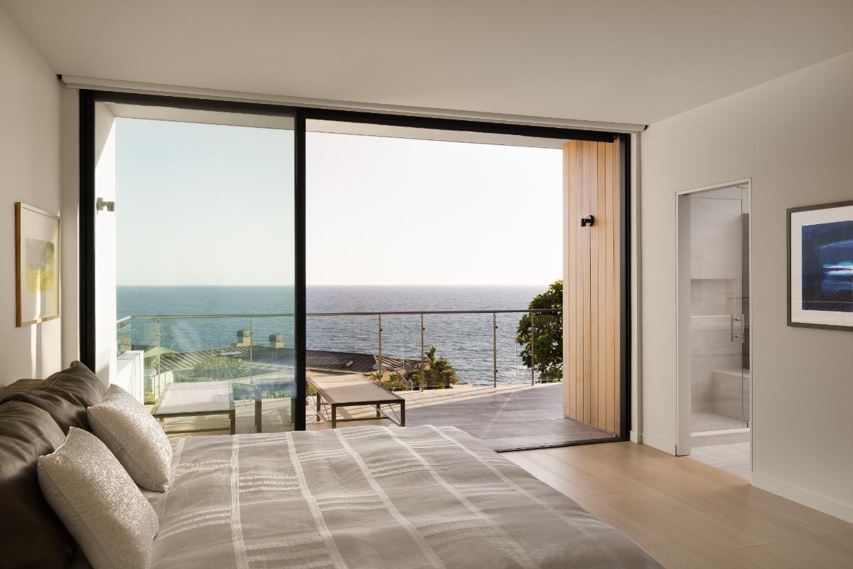 serene luxury bedroom overlooking laguna beach from a lagunitas home