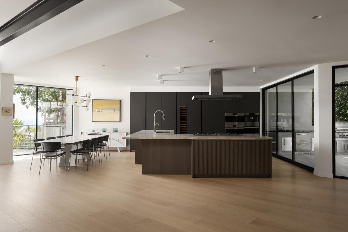 eggersmann-designed dark wood veneer finished kitchen in a lagunitas home in laguna beach