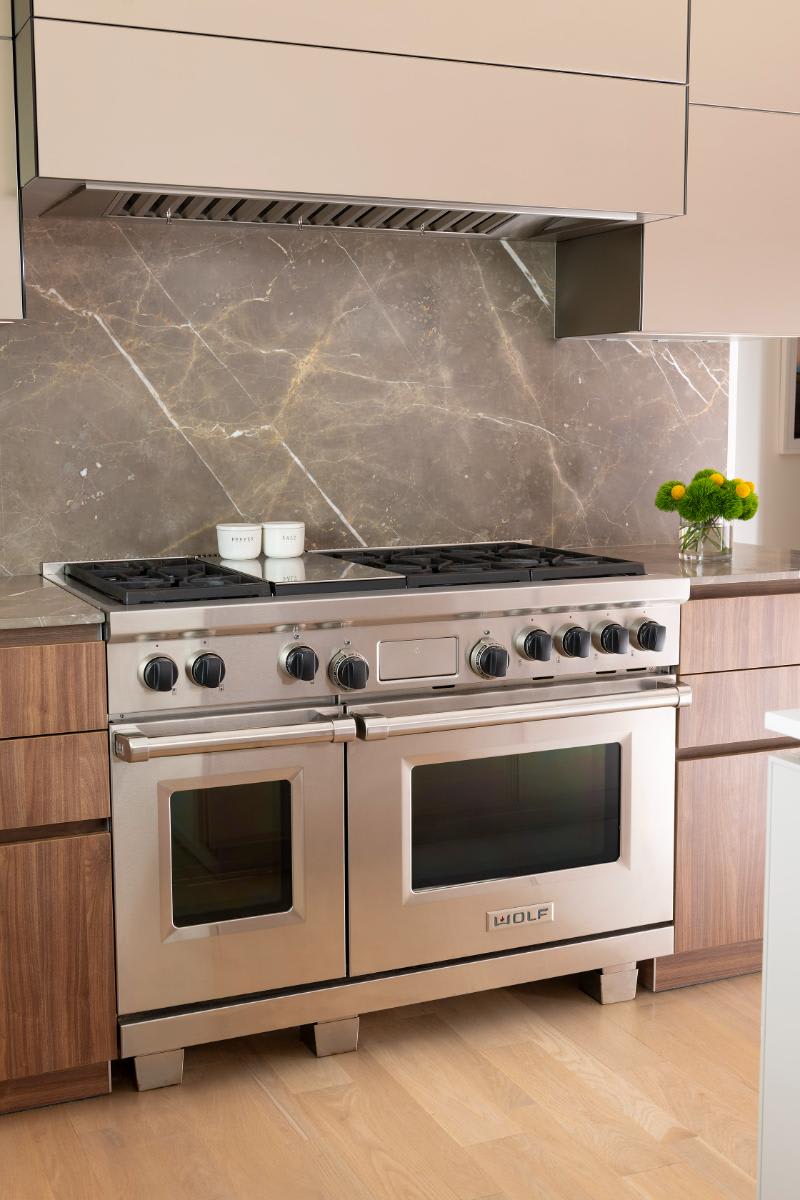 luxury Wolf range in a modern kitchen designed by eggersmann for a Preston Hollow renovation