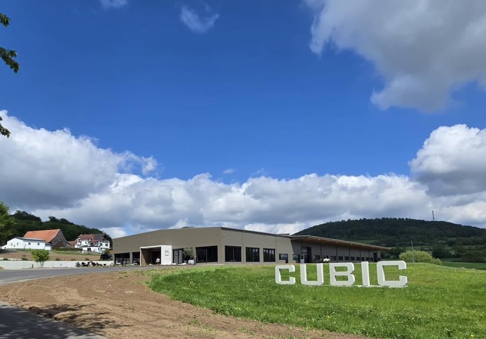 cubic factory and showroom campus from drive entrance cubic factory and showroom campus from drive entrance