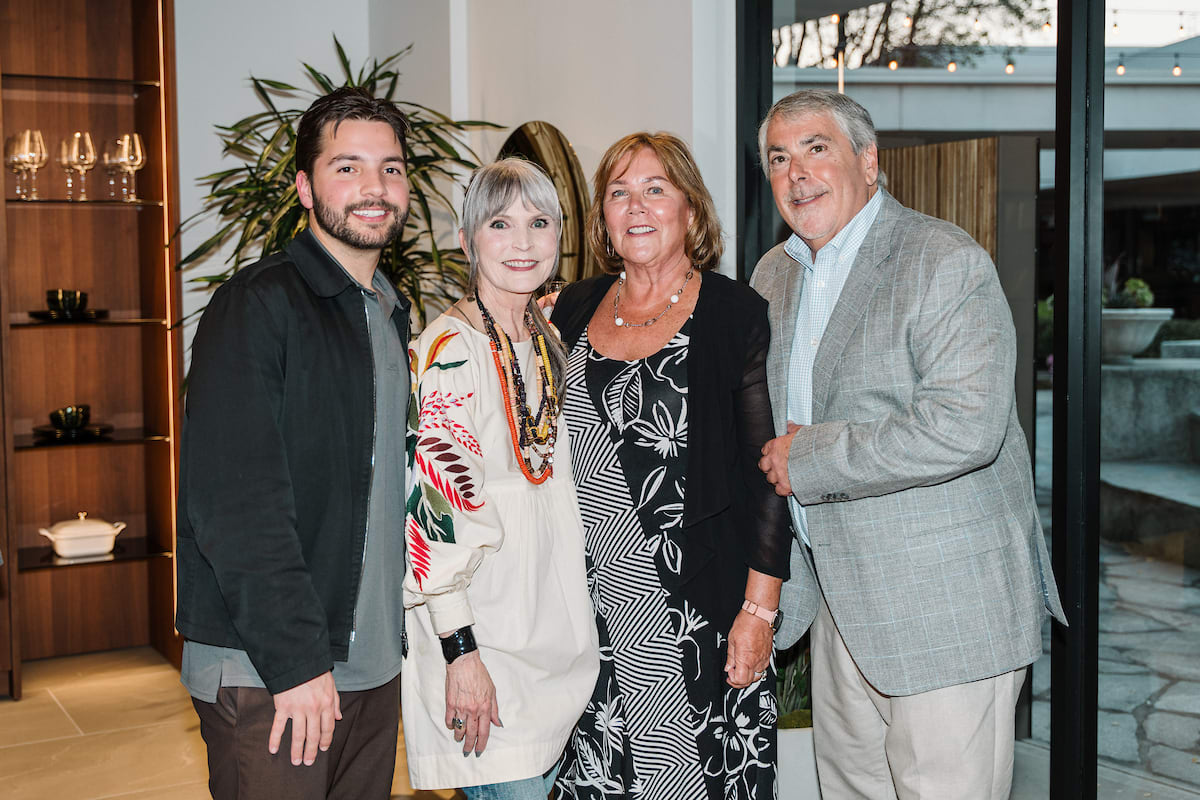 guests pose for pictures at a tequla tasting event at the eggersmann laguna showr